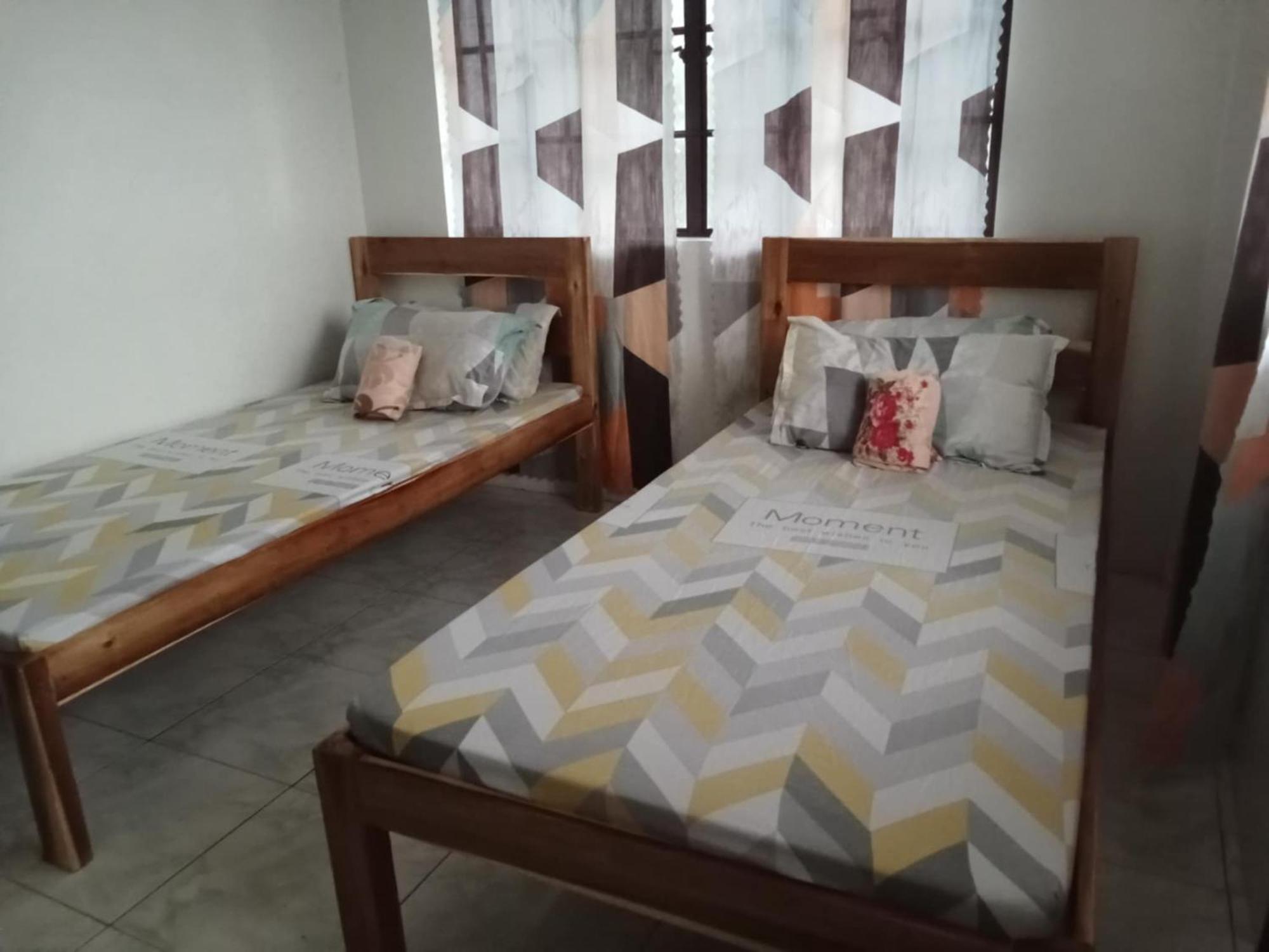Апартаменты Estrelle Orange House - Backpackers Hub Пуэрто-Принцеса Экстерьер фото